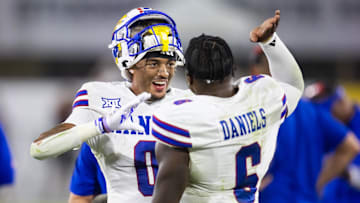 Oct 5, 2024; Tempe, Arizona, USA; Kansas Jayhawks wide receiver Quentin Skinner (0) celebrates a touchdown with quarterback Jalon Daniels (6) against the Arizona State Sun Devils.