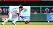 Sep 7, 2025; St. Louis, Missouri, USA; St. Louis Cardinals shortstop Masyn Winn (0) fields a grounder hit up the middle for the out on San Francisco Giants batter Drew Gilbert (not shown) in the seventh inning at Busch Stadium. Mandatory Credit: Tim Vizer-Imagn Images