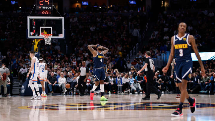 Mar 2, 2022; Denver, Colorado, USA; Denver Nuggets center DeMarcus Cousins (4) reacts at the end of the third quarter against the Oklahoma City Thunder at Ball Arena. Mandatory Credit: Isaiah J. Downing-USA TODAY Sports