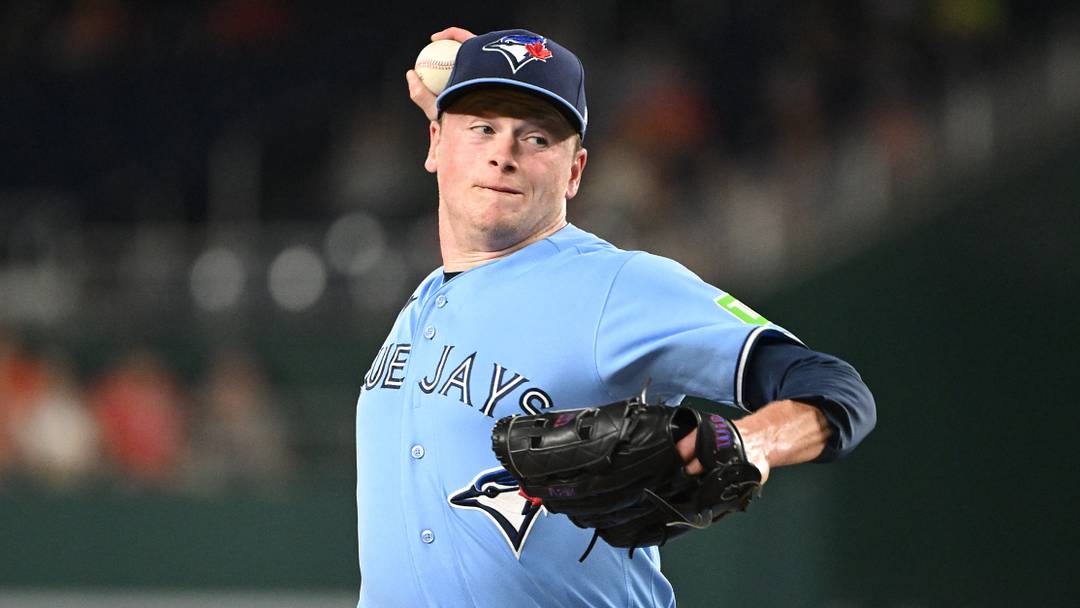 Toronto Blue Jays pitcher Louis Varland (77) throws a pitch. 