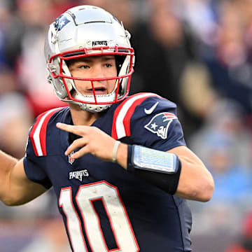 Nov 17, 2024; Foxborough, Massachusetts, USA; New England Patriots quarterback Drake Maye (10) throws the ball against the Los Angeles Rams during the second half at Gillette Stadium. Mandatory Credit: Brian Fluharty-Imagn Images