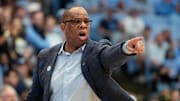 Mar 1, 2025; Chapel Hill, North Carolina, USA;  North Carolina Tar Heels head coach Hubert Davis reacts in the first half at Dean E. Smith Center. Mandatory Credit: Bob Donnan-Imagn Images