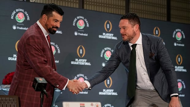 Ohio State Buckeyes head coach Ryan Day shakes hands with Oregon Ducks head coach Dan Lanning during a Rose Bowl press confer