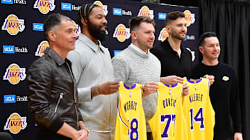 Feb 4, 2025; El Segundo, CA, USA; Los Angeles Lakers guard Luka Doncic, forward Max Kleber, forward Markieff Morris, vice president of basketball operations Rob Pelinka and head coach JJ Redick pose for photos at UCLA Health Training Center. Mandatory Credit: Gary A. Vasquez-Imagn Images