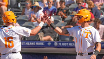 May 21, 2025; Hoover, AL, USA; Tennessee centerfielder Hunter Ensley (9) congratulates Tennessee left fielder Dalton Bargo (16) after Bargo scored during a five-run outburst in the sixth inning in the second round of the SEC Baseball Tournament at the Hoover Met.