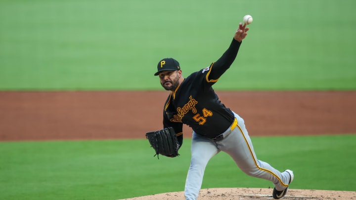 Jun 28, 2024; Atlanta, Georgia, USA; Pittsburgh Pirates starting pitcher Martin Perez (54) throws against the Atlanta Braves in the first inning at Truist Park. Mandatory Credit: Brett Davis-USA TODAY Sports