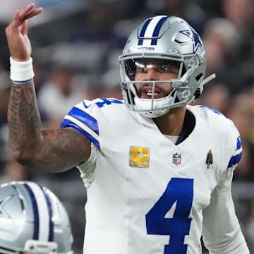 Dallas Cowboys quarterback Dak Prescott gestures at the line of scrimmage against the Las Vegas Raiders.