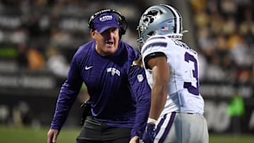 Oct 12, 2024; Boulder, Colorado, USA; Kansas State Wildcats running back Dylan Edwards (3) celebrates with head coach Chris Klieman after a touchdown during the first half against the Colorado Buffaloes at Folsom Field. Mandatory Credit: Christopher Hanewinckel-Imagn Images