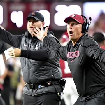 Sep 28, 2024; Tuscaloosa, Alabama, USA;  Alabama Crimson Tide head coach Kalen DeBoer lobbies hard for a safety call on a play that was ruled intentional grounding on Georgia Bulldogs quarterback Carson Beck (not pictured) at Bryant-Denny Stadium. Mandatory Credit: Gary Cosby Jr.-Imagn Images