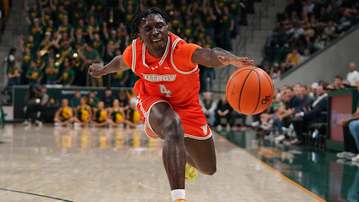 Nov 3, 2025; Waco, Texas, USA; UT Rio Grande Valley Vaqueros guard Koree Cotton (4) reaches for the loose ball against the Baylor Bears during the first half at Paul and Alejandra Foster Pavilion. Mandatory Credit: Raymond Carlin III-Imagn Images