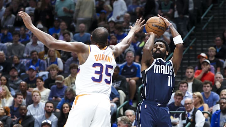 Nov 8, 2024; Dallas, Texas, USA; Dallas Mavericks guard Kyrie Irving (11) shoots as Phoenix Suns forward Kevin Durant (35) defends during the first quarter at American Airlines Center. Mandatory Credit: Kevin Jairaj-Imagn Images Nov 8, 2024; Dallas, Texas, USA; Dallas Mavericks guard Kyrie Irving (11) shoots as Phoenix Suns forward Kevin Durant (35) defends during the first quarter at American Airlines Center. Mandatory Credit: Kevin Jairaj-Imagn Images
