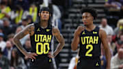 Mar 6, 2024; Salt Lake City, Utah, USA; Utah Jazz guard Jordan Clarkson (00) and guard Collin Sexton (2) speak during a second quarter break in action against the Chicago Bulls at Delta Center. Mandatory Credit: Rob Gray-Imagn Images