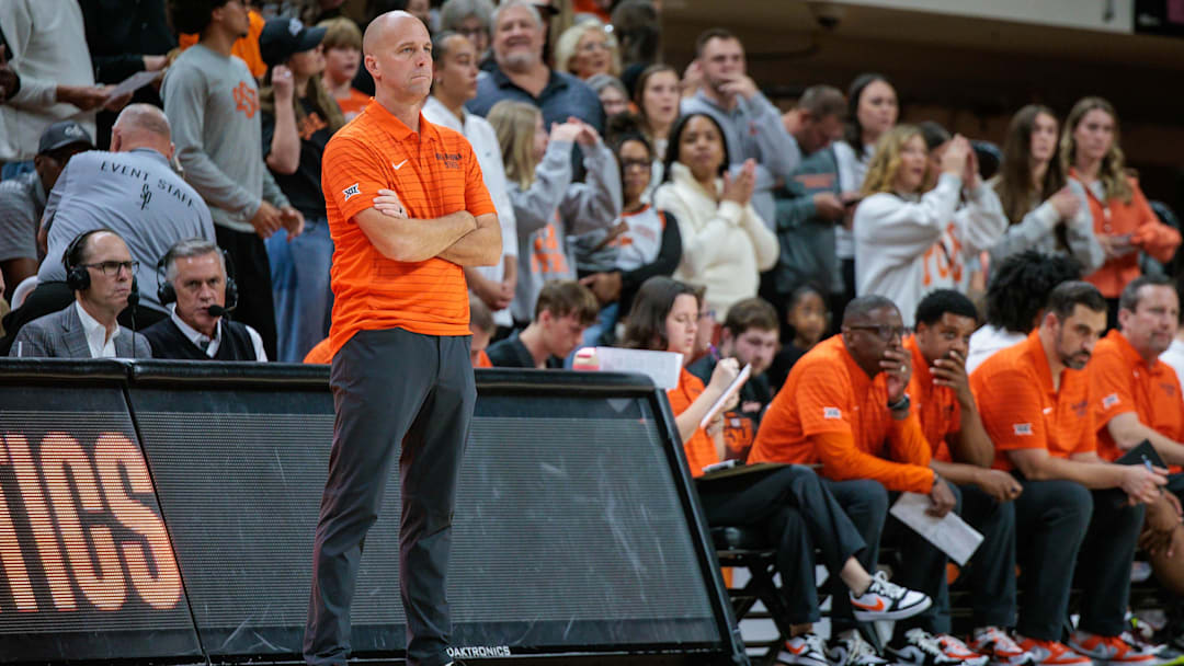 Nov 4, 2025; Stillwater, Oklahoma, USA; Oklahoma State Cowboys coach Steve Lutz watches game play during the first half against the Oral Roberts Golden Eagles at Gallagher-Iba Arena. Mandatory Credit: William Purnell-Imagn Images