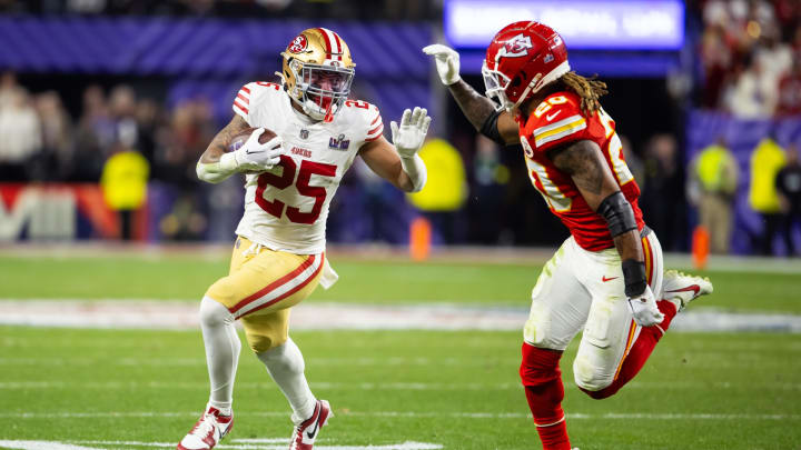 Feb 11, 2024; Paradise, Nevada, USA; San Francisco 49ers running back Elijah Mitchell (25) against Kansas City Chiefs safety Justin Reid (20) in Super Bowl LVIII at Allegiant Stadium. Mandatory Credit: Mark J. Rebilas-USA TODAY Sports