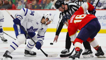 Apr 16, 2024; Sunrise, Florida, USA; Toronto Maple Leafs center Auston Matthews (34) and Florida Panthers center Aleksander Barkov (16) face-off during the first period at Amerant Bank Arena. Mandatory Credit: Sam Navarro-USA TODAY Sports