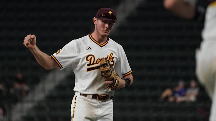 Feb 28, 2026; Arlington, TX, USA; Junior first baseman Dominic Smaldino of the Arizona State Sun Devils pumps his fist against the Tennessee Volunteers during the Amegy Bank College Baseball Series at Globe Life Field. 