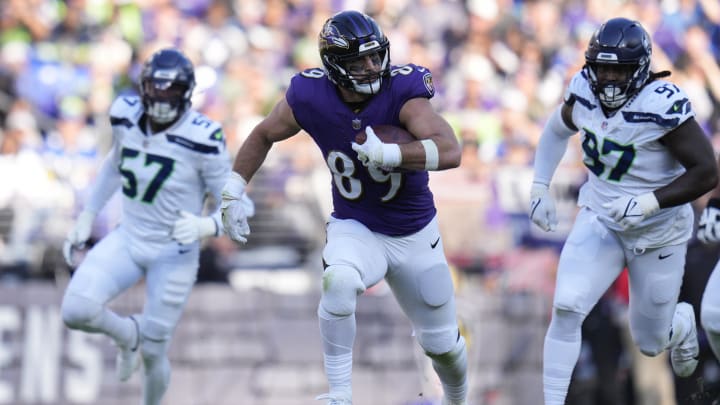 Nov 5, 2023; Baltimore, Maryland, USA;  Baltimore Ravens tight end Mark Andrews (89) runs with the ball against the Seattle Seahawks during the third quarter at M&T Bank Stadium. Mandatory Credit: Jessica Rapfogel-USA TODAY Sports