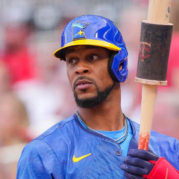 Jun 14, 2024; Minneapolis, Minnesota, USA; Minnesota Twins outfielder Byron Buxton (25) in the on deck circle debuting the City Connect uniforms against the Oakland Athletics in the second inning at Target Field. Mandatory Credit: Brad Rempel-USA TODAY Sports