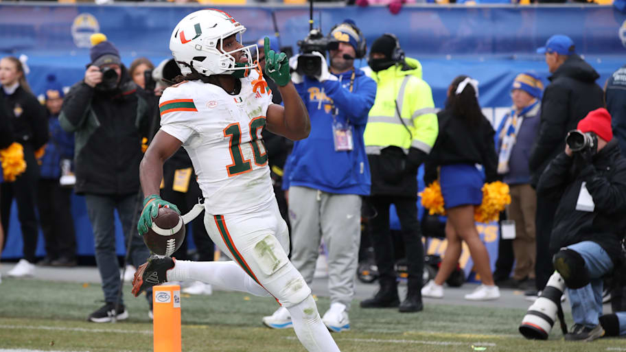 Hurricanes wide receiver Malachi Toney reacts after catching a touchdown pass against Pittsburgh.