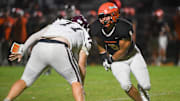 South Gibson's Yahya Gaad (8) tries to get past Hardin County's Caleb Murphy (77) during the TSSAA Football match between Hardin County and South Gibson in Medina, Tenn., on Friday. Sept. 6, 2024.