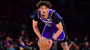Feb 6, 2025; Los Angeles, California, USA; Los Angeles Lakers center Jaxson Hayes (11) controls the ball against the Golden State Warriors during the first half at Crypto.com Arena.