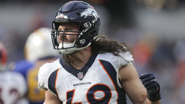 Denver Broncos inside linebacker Alex Singleton (49) celebrates in the first half in a game against the Los Angeles Chargers.