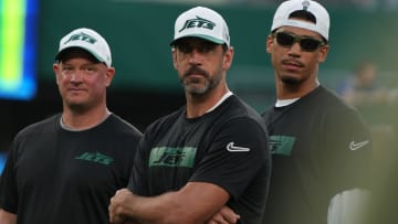 East Rutherford, NJ -- August 24, 2024 -- Jets offensive coordinator Nathaniel Hackett, Aaron Rodgers and Allen Lazard of the Jets before the game. The New York Giants and New York Jets meet at MetLife Stadium in the final preseason game of the 2024 season for both teams.