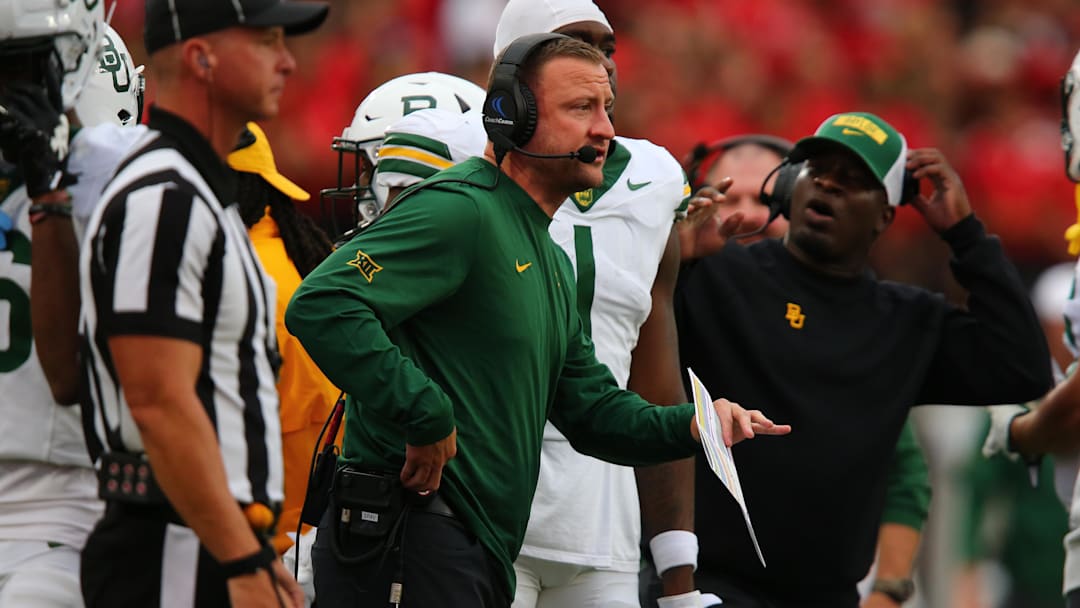 Oct 19, 2024; Lubbock, Texas, USA;  Baylor Bears assistant coach Jake Spavital in the second half during the game against the Texas Tech Red Raiders at Jones AT&T Stadium and Cody Campbell Field. Mandatory Credit: Michael C. Johnson-Imagn Images