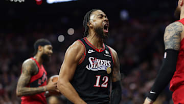 Nov 8, 2025; Philadelphia, Pennsylvania, USA; Philadelphia 76ers forward Trendon Watford (12) reacts after a score and foul against the Toronto Raptors during the first quarter at Xfinity Mobile Arena. Mandatory Credit: Bill Streicher-Imagn Images