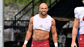 Washington Commanders running back Austin Ekeler (30) arrives at training camp at Gillette Stadium. 