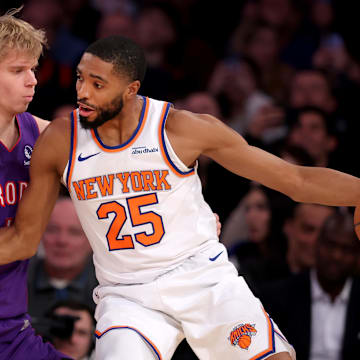 New York Knicks forward Mikal Bridges controls the ball against Toronto Raptors guard Gradey Dick. Mandatory Credit: Brad Penner-Imagn Images