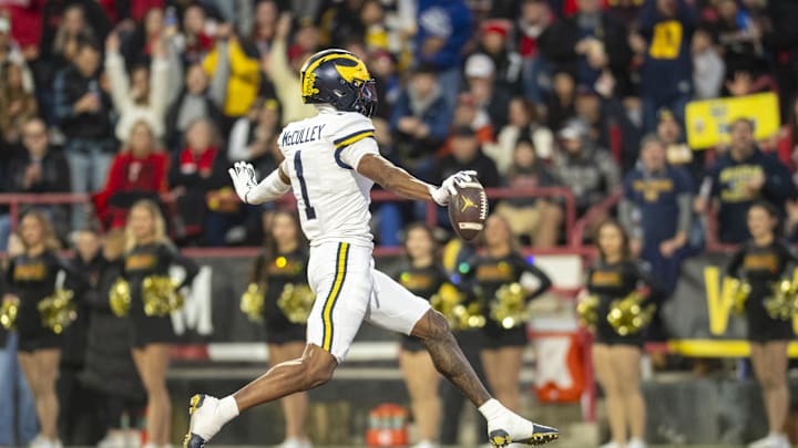 Nov 22, 2025; College Park, Maryland, USA;  Michigan Wolverines wide receiver Donaven McCulley (1) celebrates after a first half touchdown against the Maryland Terrapins at SECU Stadium. Mandatory Credit: Tommy Gilligan-Imagn Images