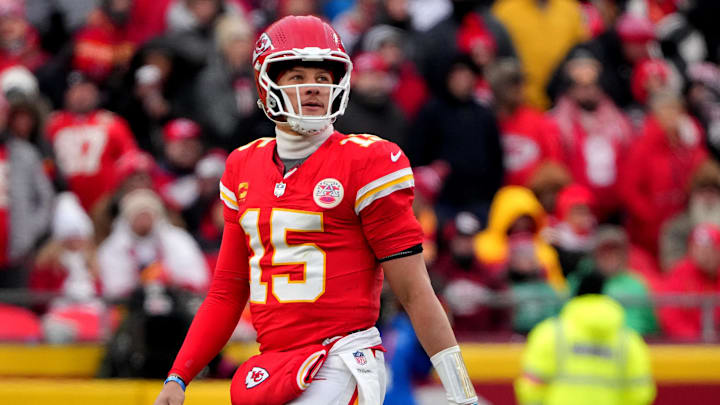 Kansas City Chiefs quarterback Patrick Mahomes (15) watches the replay board as he walks to the sideline after being sacked by the Houston Texans during the second quarter of a 2025 AFC divisional round game at GEHA Field at Arrowhead Stadium.