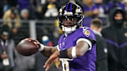 Baltimore Ravens quarterback Lamar Jackson warms up before an AFC wild card game against the Pittsburgh Steelers.