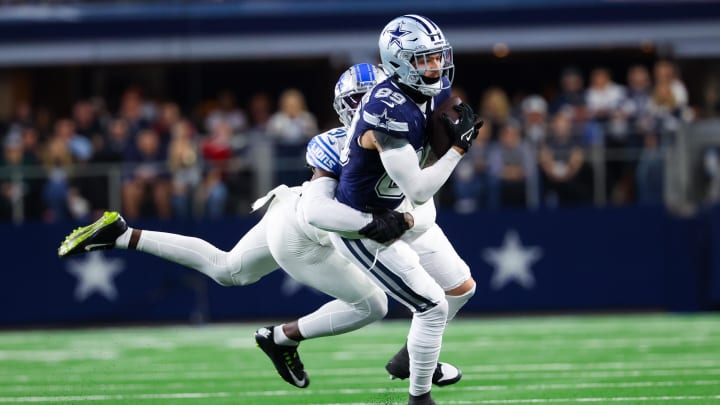 Dec 30, 2023; Arlington, Texas, USA;  Dallas Cowboys tight end Peyton Hendershot (89) catches a pass as Detroit Lions safety Kerby Joseph (31) defends during the first half at AT&T Stadium. Mandatory Credit: Kevin Jairaj-USA TODAY Sports