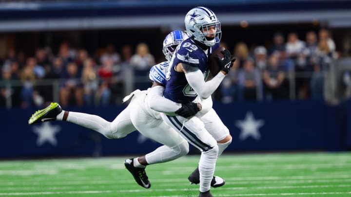 Dec 30, 2023; Arlington, Texas, USA;  Dallas Cowboys tight end Peyton Hendershot (89) catches a pass as Detroit Lions safety Kerby Joseph (31) defends during the first half at AT&T Stadium. Mandatory Credit: Kevin Jairaj-USA TODAY Sports