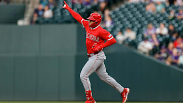 Sep 19, 2025; Denver, Colorado, USA; Los Angeles Angels second baseman Christian Moore (4) gestures on a two run home run in the second inning against the Colorado Rockies at Coors Field. Mandatory Credit: Isaiah J. Downing-Imagn Images