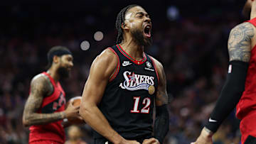 Nov 8, 2025; Philadelphia, Pennsylvania, USA; Philadelphia 76ers forward Trendon Watford (12) reacts after a score and foul against the Toronto Raptors during the first quarter at Xfinity Mobile Arena. Mandatory Credit: Bill Streicher-Imagn Images
