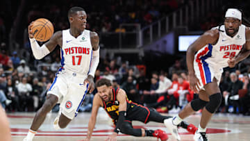 Feb 23, 2025; Atlanta, Georgia, USA; Detroit Pistons guard Dennis Schroder (17) and Detroit Pistons center Isaiah Stewart (28) run offensive screen against Atlanta Hawks guard Trae Young (11): Jordan Godfree-Imagn Images