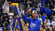 Duke Blue Devils head coach Jon Scheyer cuts down the net after the Duke Blue Devils beat the Alabama Crimson Tide in the East Regional final of the 2025 NCAA tournament at Prudential Center.