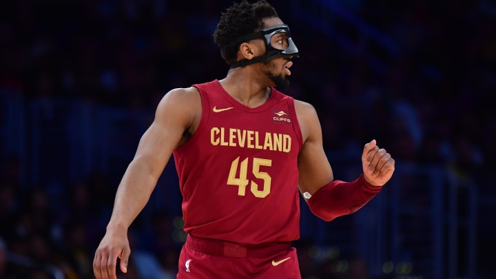 Apr 6, 2024; Los Angeles, California, USA; Cleveland Cavaliers guard Donovan Mitchell (45) reacts against the Los Angeles Lakers during the second half at Crypto.com Arena.