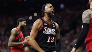Nov 8, 2025; Philadelphia, Pennsylvania, USA; Philadelphia 76ers forward Trendon Watford (12) reacts after a score and foul against the Toronto Raptors during the first quarter at Xfinity Mobile Arena. Mandatory Credit: Bill Streicher-Imagn Images