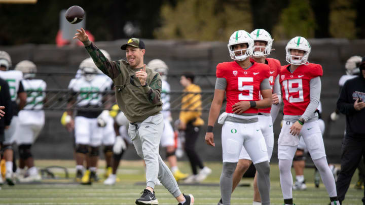 Oregon offensive coordinator and quarterbacks coach Will Stein throws during practice with the Oregon Ducks Saturday, April 6, 2024 at the Hatfield-Dowlin Complex in Eugene, Ore.