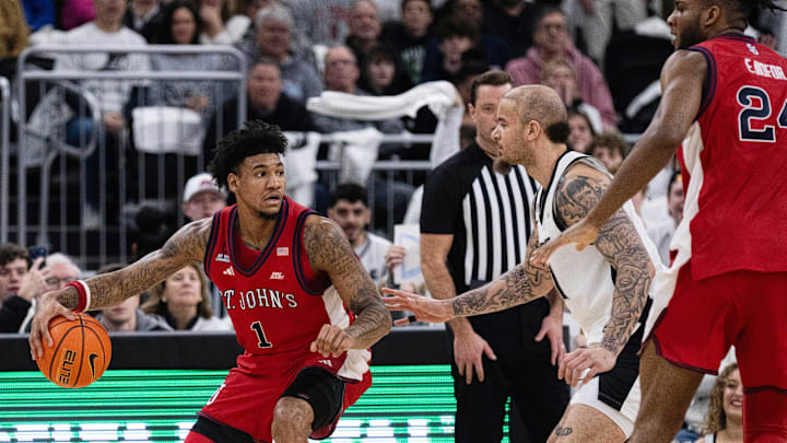 Feb 14, 2026; Providence, Rhode Island, USA; St. John’s basketball forward Dillon Mitchell (1) dribbles during the first half of the game against the Providence College Friars at Amica Mutual Pavilion. 