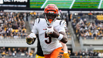 Bengals Tee Higgins (5) takes the ball down the field during their game against the Steelers on Sunday November 16, 2025 at Acrisure Stadium.