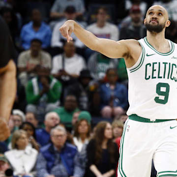 Mar 31, 2025; Memphis, Tennessee, USA; Boston Celtics guard Derrick White (9) reacts during the fourth quarter against the Memphis Grizzlies at FedExForum. Mandatory Credit: Petre Thomas-Imagn Images