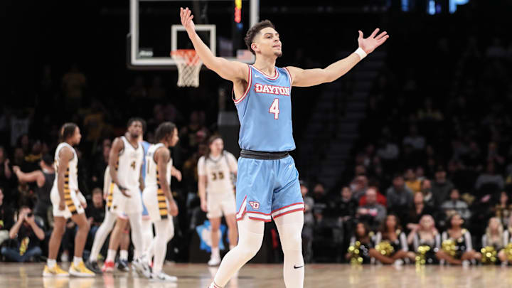 Mar 12, 2023; Brooklyn, NY, USA;  Dayton Flyers guard Koby Brea (4) waves to the crowd after a timeout is called by the Virginia Commonwealth Rams in the first half at Barclays Center. Mandatory Credit: Wendell Cruz-Imagn Images