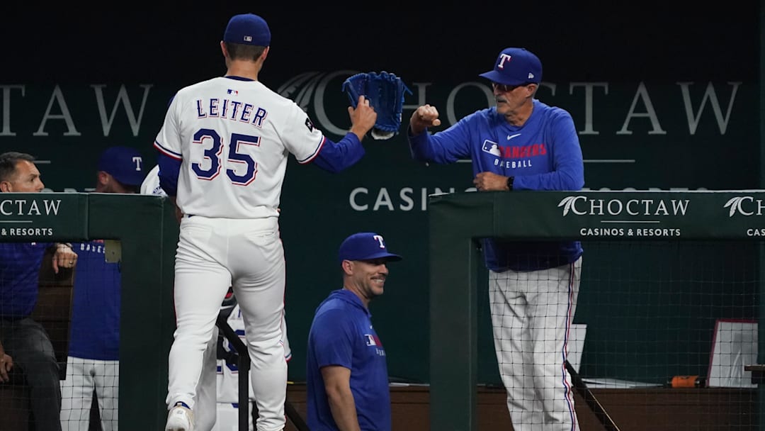May 13, 2025; Arlington, Texas, USA; Texas Rangers pitcher Jack Leiter (35) bumps fist with pitching coach Mike Maddux (31) as he walks to the dugout after striking out the side during the fourth inning against the Colorado Rockies at Globe Life Field. Mandatory Credit: Raymond Carlin III-Imagn Images May 13, 2025; Arlington, Texas, USA; Texas Rangers pitcher Jack Leiter (35) bumps fist with pitching coach Mike Maddux (31) as he walks to the dugout after striking out the side during the fourth inning against the Colorado Rockies at Globe Life Field. Mandatory Credit: Raymond Carlin III-Imagn Images