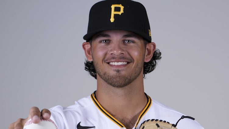 Feb 22, 2023; Bradenton, FL, USA;  Pittsburgh Pirates pitcher Jared Jones (81) poses for photos