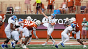 Sep 6, 2025; Austin, Texas, USA; San Jose State Spartans quarterback Walker Eget (5) passes the ball during the second half against the Texas Longhorns at Darrell K Royal-Texas Memorial Stadium. Mandatory Credit: Scott Wachter-Imagn Images
